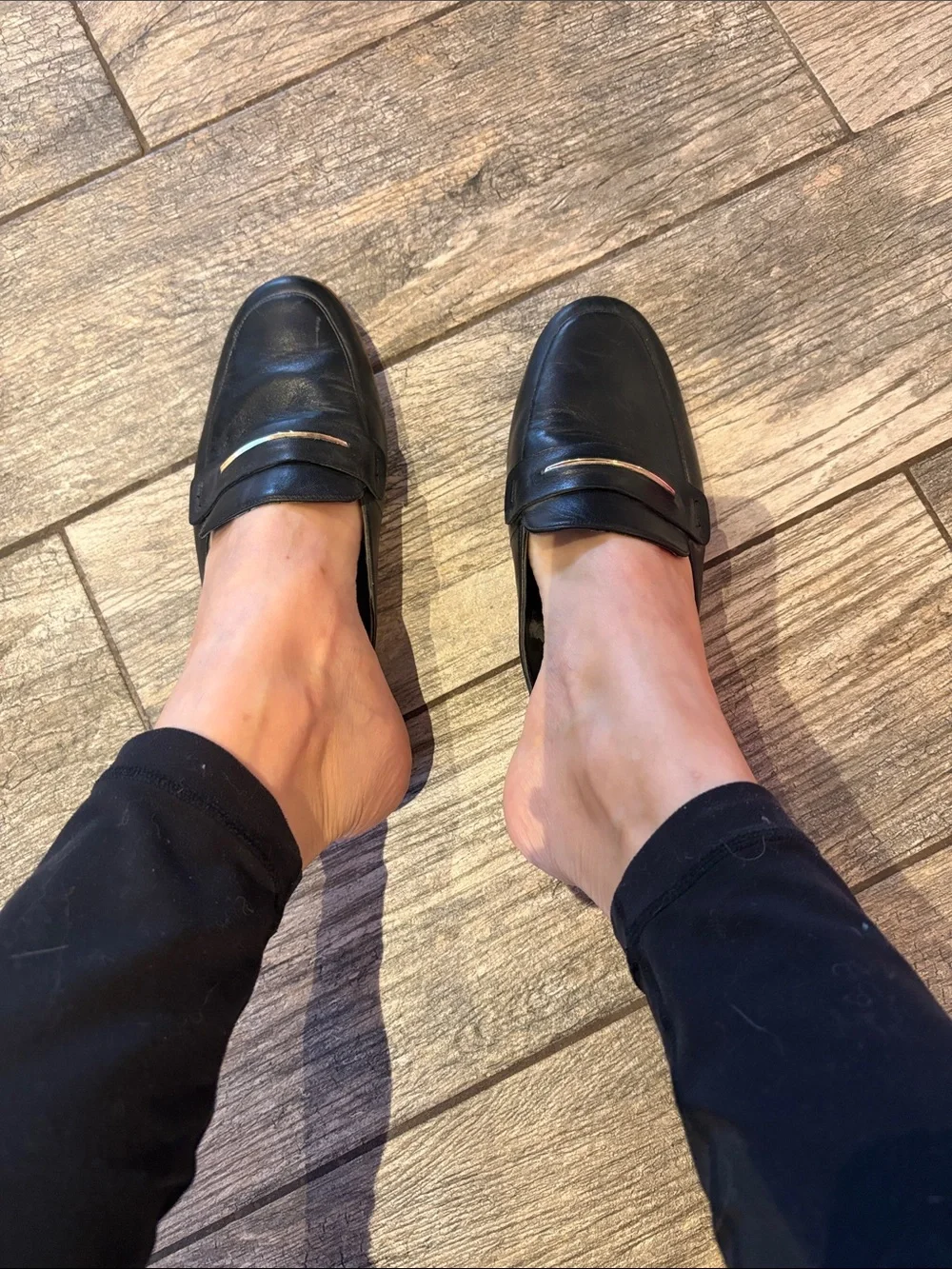 Well worn Black Slip-On Leather Loafers for women